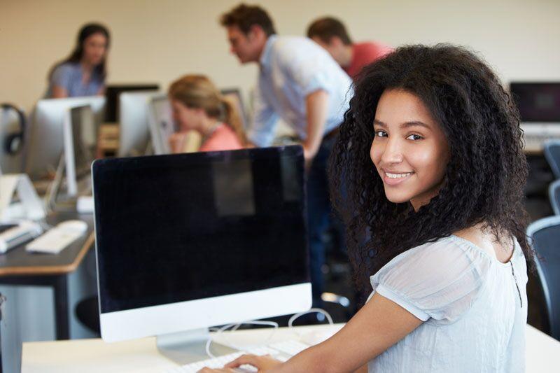 woman working at computer, BDI classes in Florida