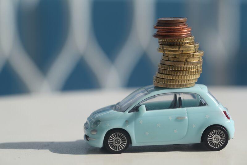 toy car with coins stacked on top, getting rid of your high-risk label